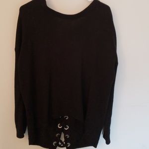 Oversized black sweater with lace up back